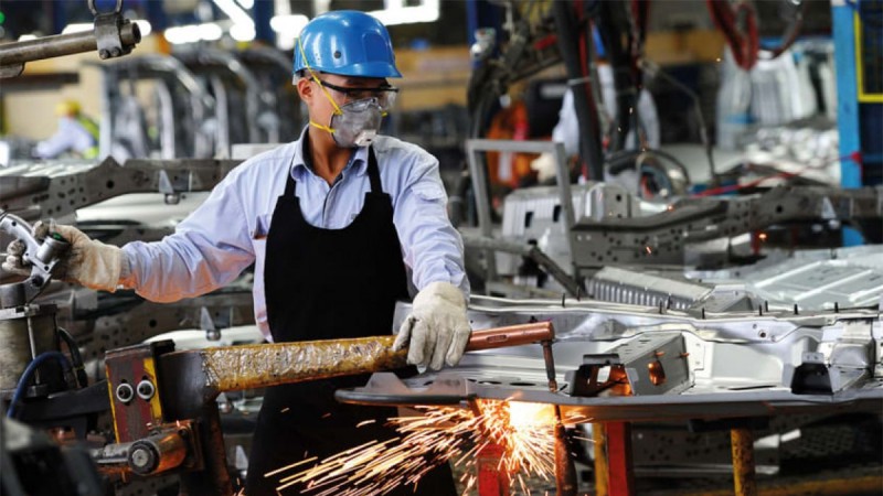 Kinh tế Việt Nam đang trong quá trình công nghiệp hóa. (Ảnh:Hoang Dinh Nam/AFP)